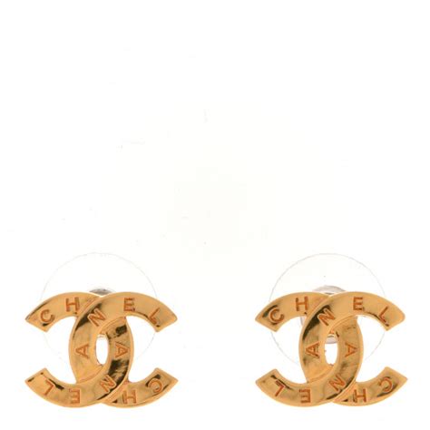 chanel metal cc paris button stud earrings gold|chanel earrings value.